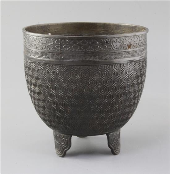 A Chinese bronze tripod vessel, 17th century, h. 18cm, handle lacking